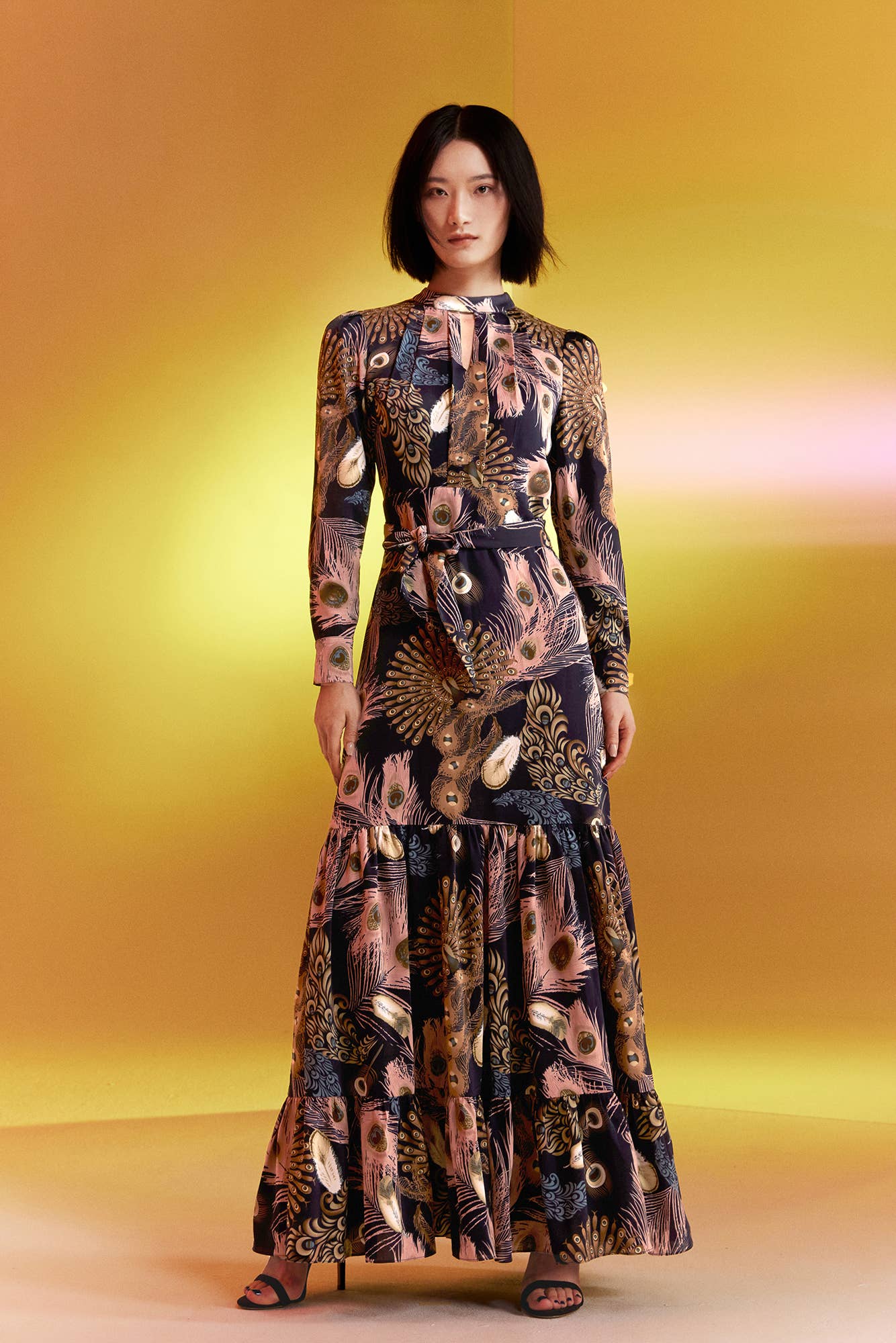 Bohemian style long dress with ruffles and feather print