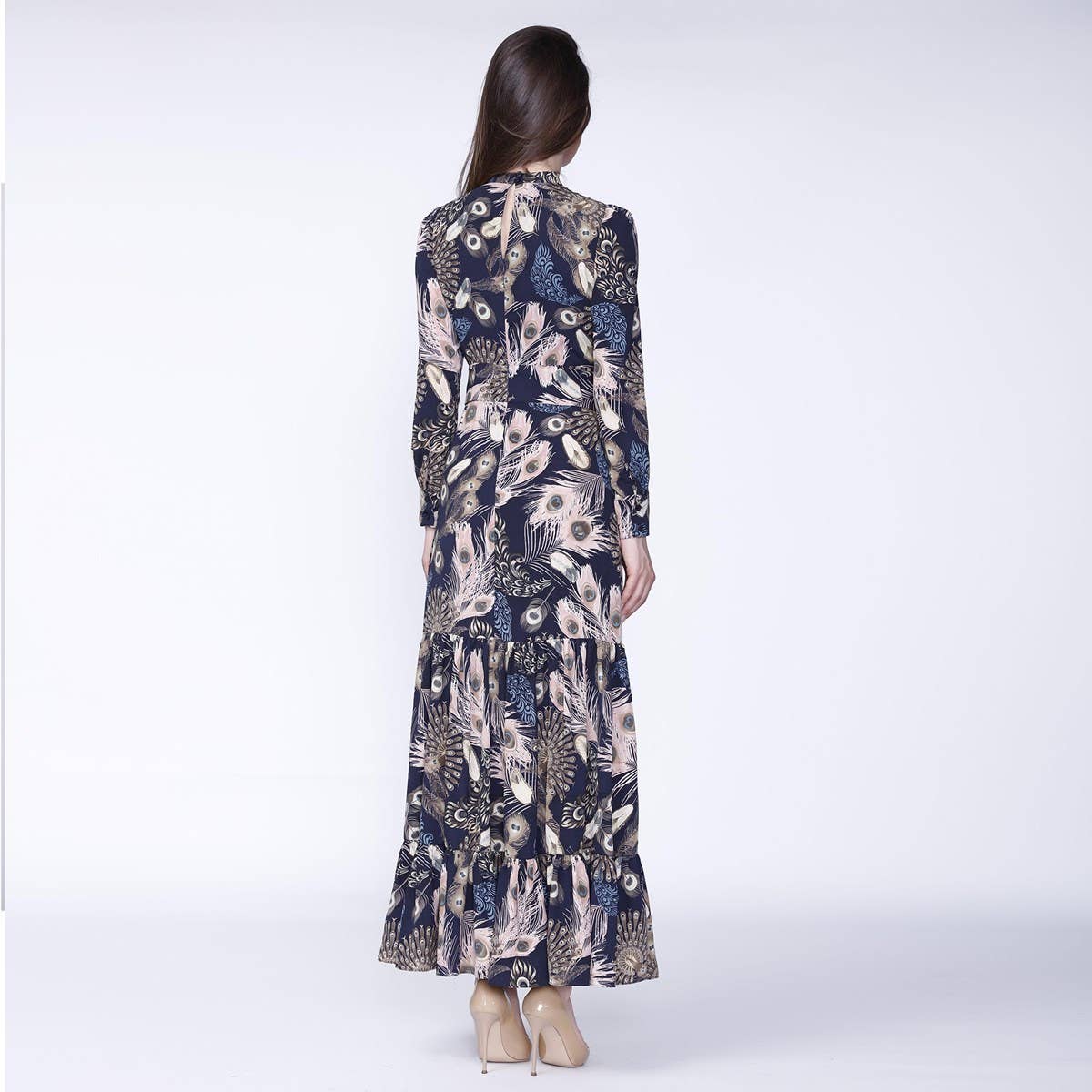 Bohemian style long dress with ruffles and feather print